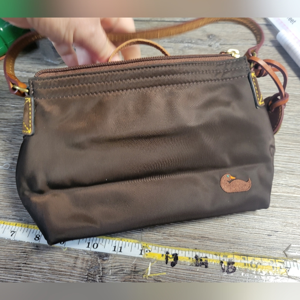 Dooney and Bourke Brown nylon Hand bag‎